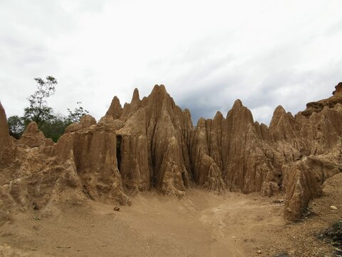 Sao Din Na Noi in Nan Province, Thailand. The landscape features numerous tall, pointed earth pillars formed naturally over approximately thirty thousand years through ero