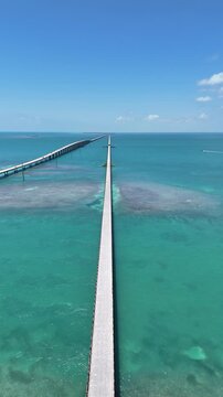 Aerial view of old seven mile bridge and the newer, current seven mile bridge near Pigeon Key in Monroe County, Florida.