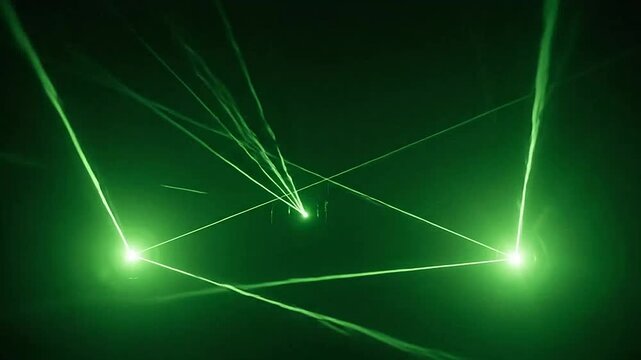 Abstract green light beams radiating from a central point in a dark environment
