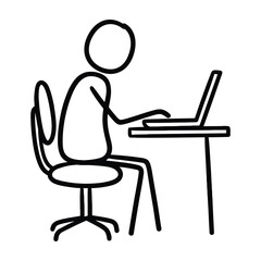 Fototapeta premium Person sitting at desk working on laptop computer