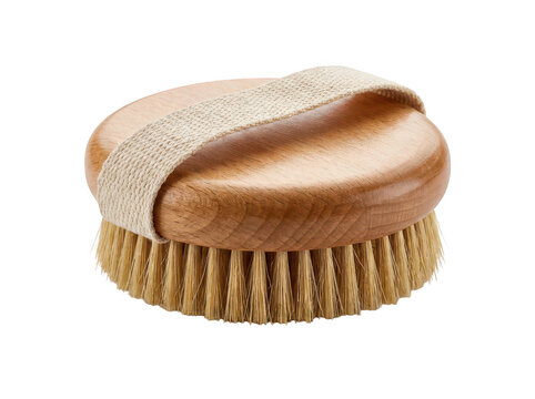 Round wooden dry body massage brush with natural bristles and a woven cotton strap for exfoliating skin and lymphatic drainage spa treatments isolated transparent background image