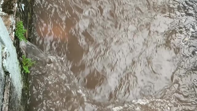 water flowing into the river