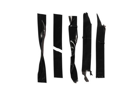 Five torn and broken strips of black electrical tape arranged vertically on a clean background, creating abstract shapes, different shapes and textures