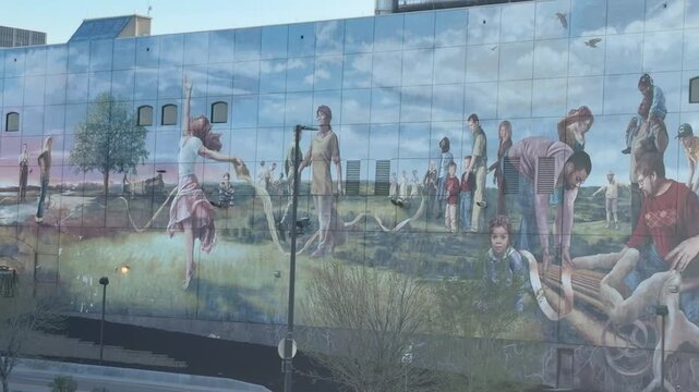 Omaha, NE USA April 16, 2026 Editorial of the Fertile Ground mural in downtown Omaha, Nebraska, with a slow zoom out and natural city ambience including birds and traffic.