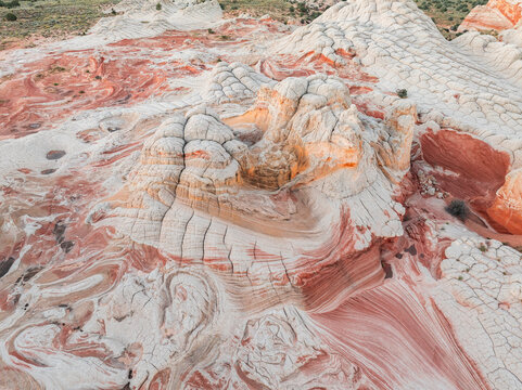 Aerial view of the unique swirling sandstone formations and white brain rock of White Pocket under soft light Coconino County, Arizona, United States.