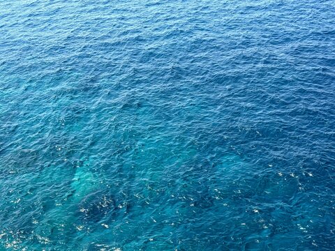 Blue ocean sea water aerial view background.