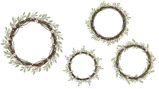 Beautiful set of four rustic circular wreaths made of wooden branches, green leaves, and delicate white flowers in various sizes.