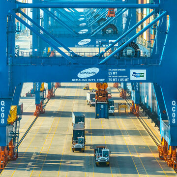 Aerial top down view of a large container cargo ship in motion over open ocean Ba Ria Vung Tau, Ho Chi Minh city, Vietnam