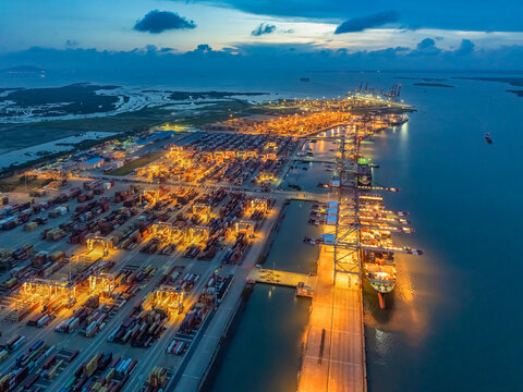 Aerial top down view of a large container cargo ship in motion over open ocean Ba Ria Vung Tau, Ho Chi Minh city, Vietnam