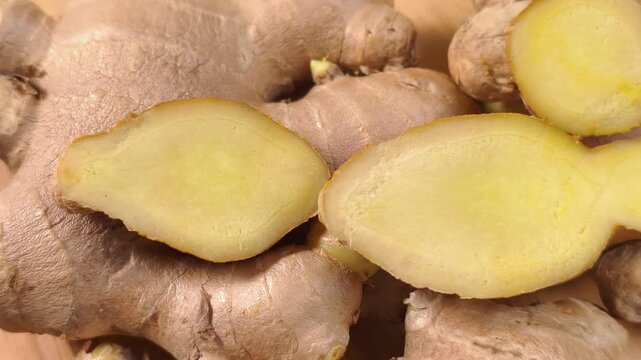 Sliced ginger root showing its pale yellow interior