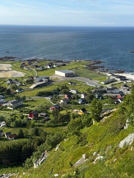 Ramberg village nestled along the fjord with dramatic Lofoten mountains, Norway