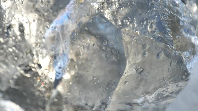 Ice chunks texture close-up. Winter frosty wallpaper. Natural beautiful winter texture.