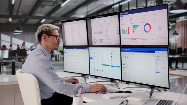 Payroll Manager Reviewing Company Software System