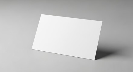 Fototapeta premium Blank White Business Card Mockup on Gray Background.