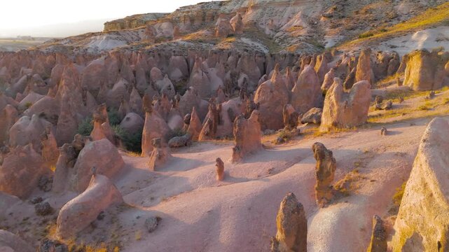 Goreme, Nevsehir, Turkey. Fantasy landscape of Devrent Valley with alien-like rock formations and surreal colors during evening hours.. Aerial View, Point of interest