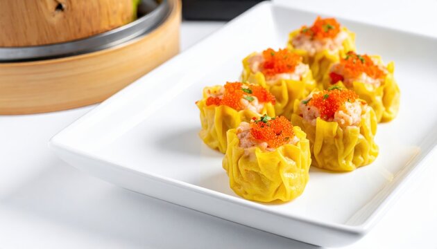 Delicious Steamed Siu Mai Dumplings with Pork, Shrimp, and Crab Roe Garnish on a White Plate