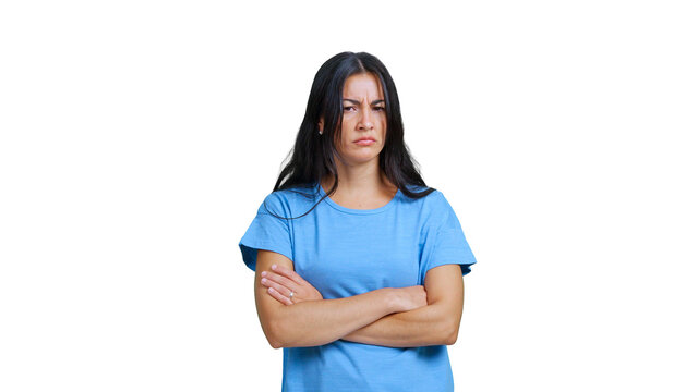 Frustrated young woman crossing arms looking annoyed