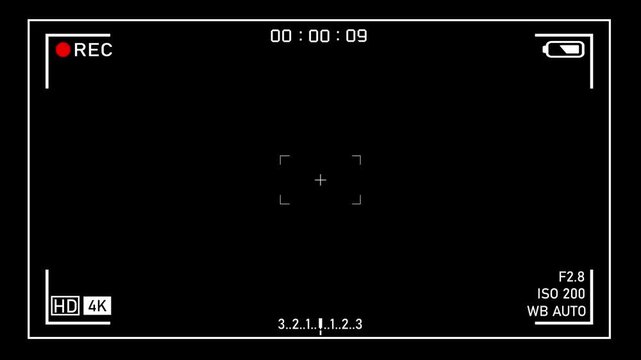 digital camera viewfinder overlay featuring classic recording interface elements including a battery indicator, record status, time code, and camera settings for professional video production