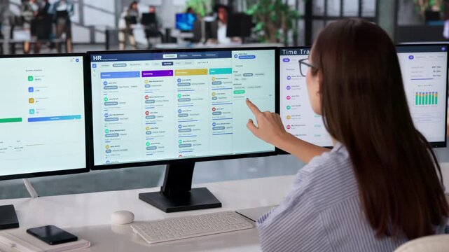 Human Resource Manager Reviewing Employee Data