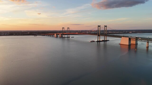 Aerial view of Delaware Memorial Bridge over Delaware River at sunset