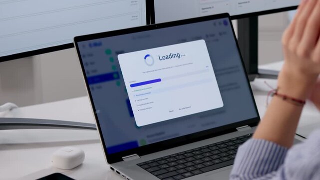 Tired Employee Waiting For Slow Loading Progress Bar To Fill While Working