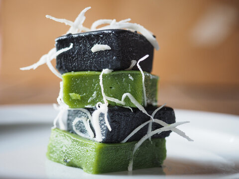 Thai green pandanus pudding and black coconut charcoal pudding