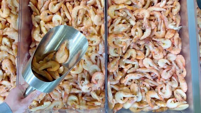 Buying shrimps at the grocery store	