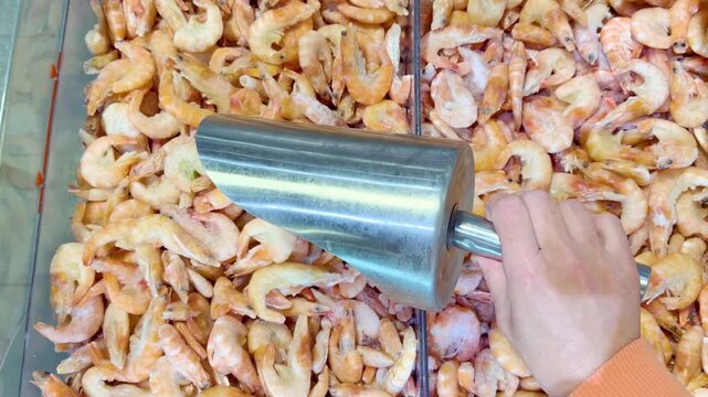 Buying shrimps at the grocery store	