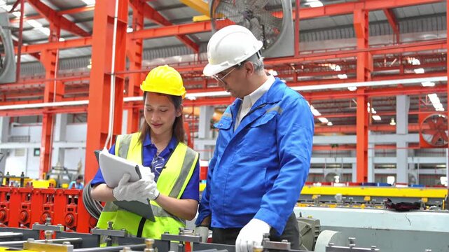 Collaborative safety meeting industrial facility business setting modern workspace close-up team engagement
