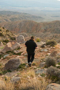 ginger man in beanie at keys view at sunset