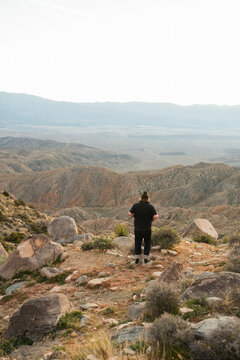ginger man in beanie at keys view at sunset