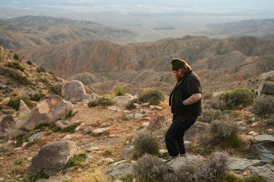 ginger man in beanie at keys view at sunset