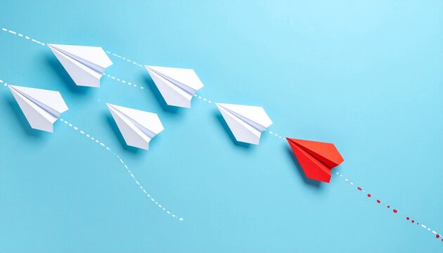 A minimalist digital artwork featuring a group of paper airplanes arranged on a light blue background. Most of the airplanes are white, flying in the same direction, while one red airplane is position