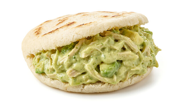 Venezuelan arepa reina pepiada with chicken creamy avocado green filling