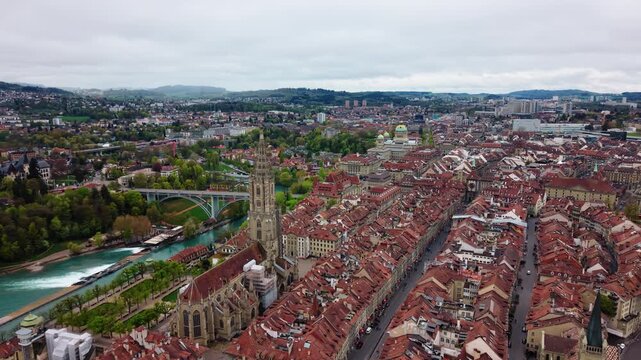 Aerial: Bern old town, Church of St. Peter and Paul and Federal Palace of Switzerland, parallax drone shot