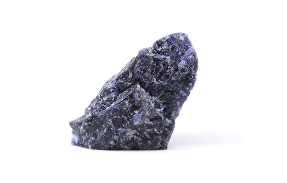 Splinter of raw sodalite stone on white background. It is a used as crystal healer and in jewellery