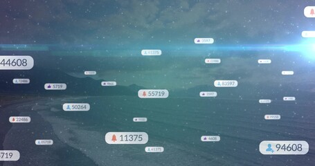 Obraz premium Floating notification badges drifting across twilight coast and sea, displaying numeric counters