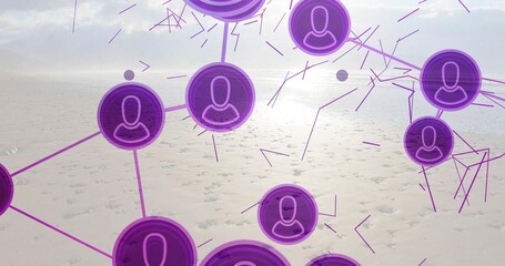 Obraz premium Floating cluster of connected purple user nodes overlaying wet sand at coast, with glowing lines