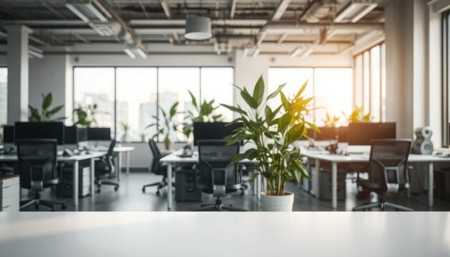 Bright contemporary workspace with desks, chairs, computers, and plants, ideal for corporate presentations, business concepts, and modern office themes