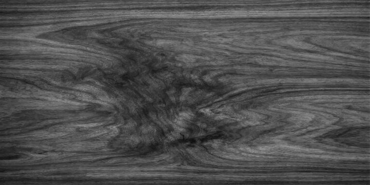 Dark wood texture and black grunge surface meet white chalk patterns in an abstract winter landscape of ocean waves and stone