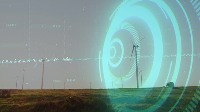 Wind turbines rotating on plain, wind activating cyan ring and waveform displaying power data