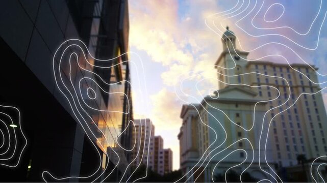 Drifting white contour overlay growing with sunset over city canyon, showing glass and cupola