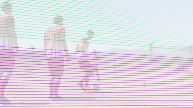 Dribbling player in red-white striped jersey weaving soccer ball through cones on pitch, copy space