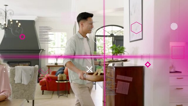 Guest rising man carrying bowls placing plates hugging woman magenta overlaying guests for dining