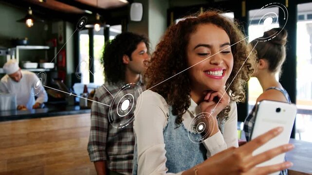 Woman making peace sign with white phone, lowering and tapping while AR tech linking customers
