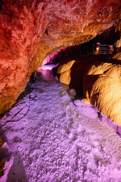 Majestic Stalactites and Stalagmites Speleothems Inside Limestone Cave.