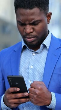 Angry Investor Reacts. Market Downturn Causes Tension For Business Person Outside Workplace. Financial Professional Displays Anger And Concern After Significant Investment Setback Outdoors