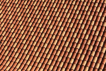 New terracotta fired clay roof tiles in Dubrovnik, Croatia. Mediterran style orange red tiled roof. © Tupungato