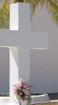 Whitewashed white cross on the door of an Andalusian hermitage, Torrox, Spain