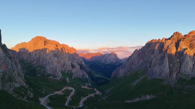 Epic Mountain Sunset with Traffic on Rock Road Aerial View